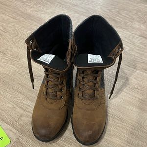 Joan of Artic Sorel wedge boots.